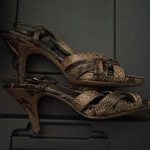 Bandolino size 8 M strappy heels. In used condition but still have life. Pics.